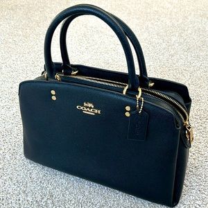 New. Never used Coach purse.